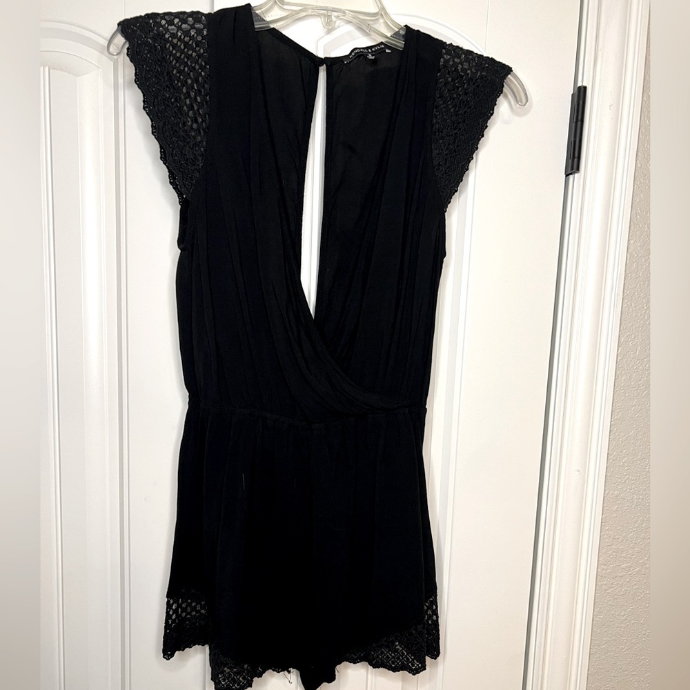 Kendall & Kylie Black Romper Short Sleeve Cross Front Size Small. BARELY WORN